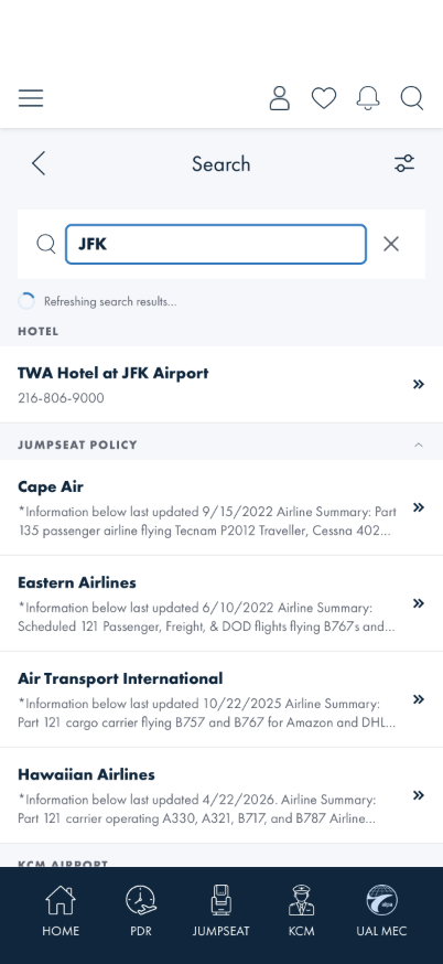 Real Hotel, Jumpseat Policy, and KCM Airport results for 'JFK' returned immediately while the Refreshing search results notice is still showing